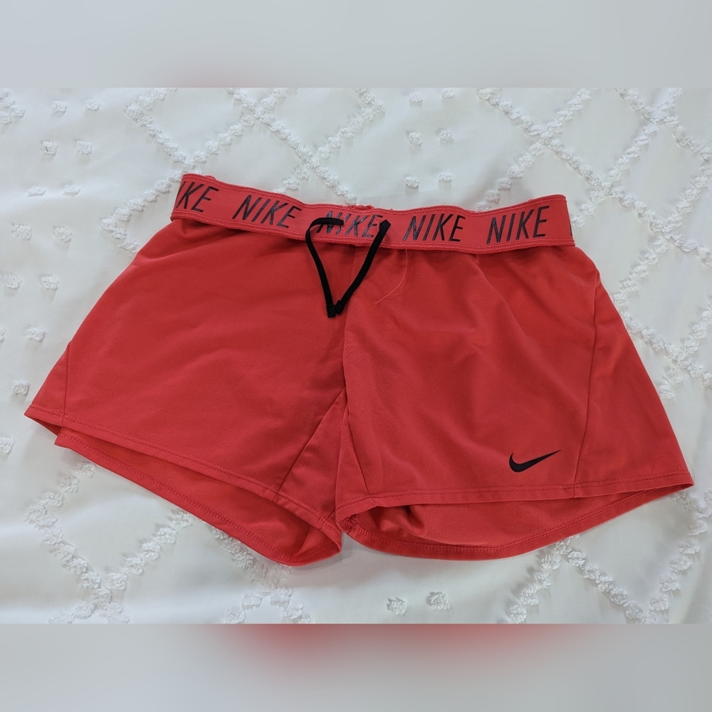 Never worn Coral Dri-Fit Nike shorts